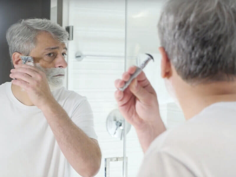 me shaving at a mirror