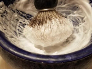 building lather with the art of shaving sandalwood shaving cream