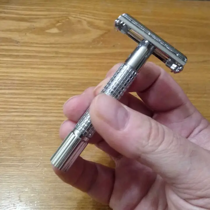 safety razor in hand