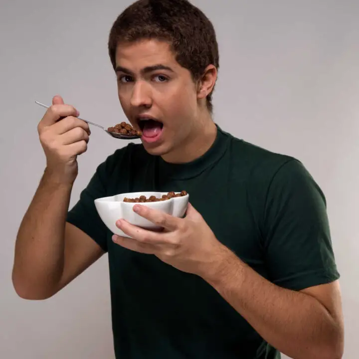 man eating cereal