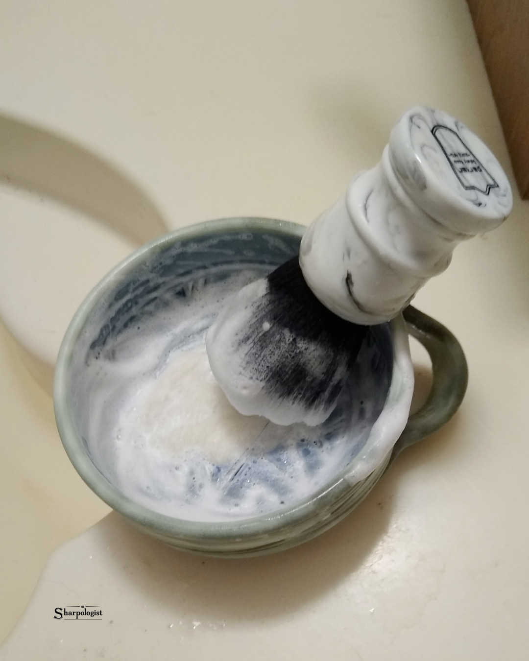 brush bowl and lather from shaving soap sample