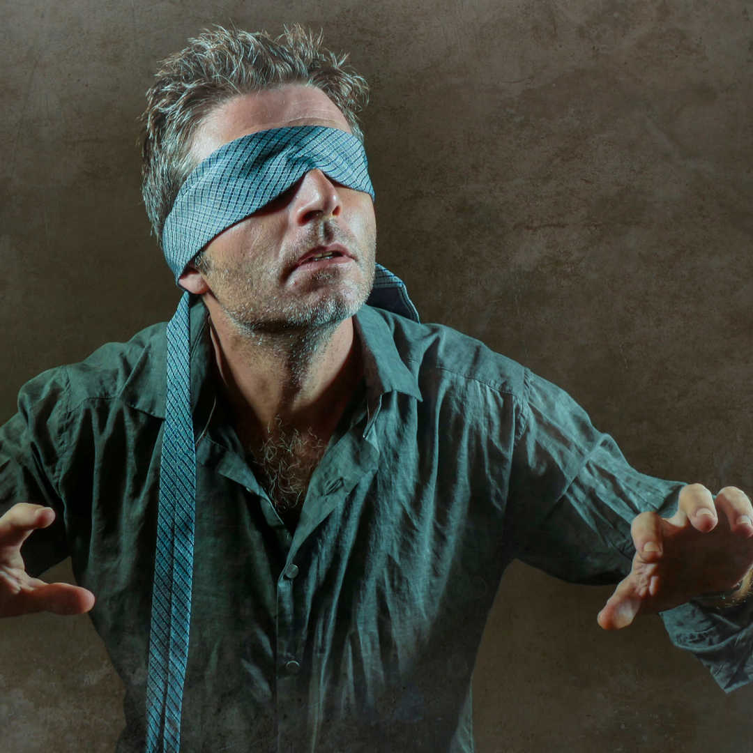 blindfolded man