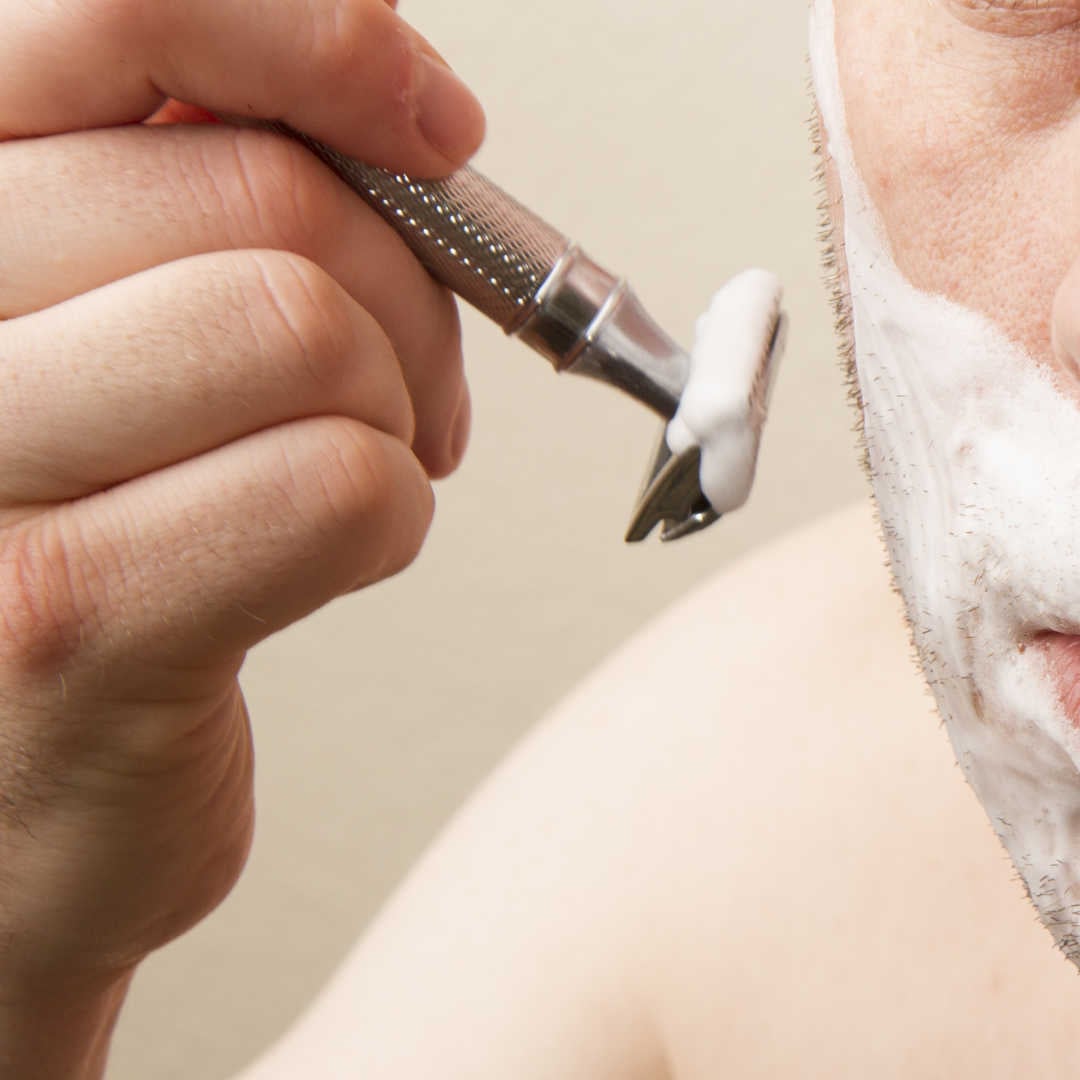 closeup of razor to face