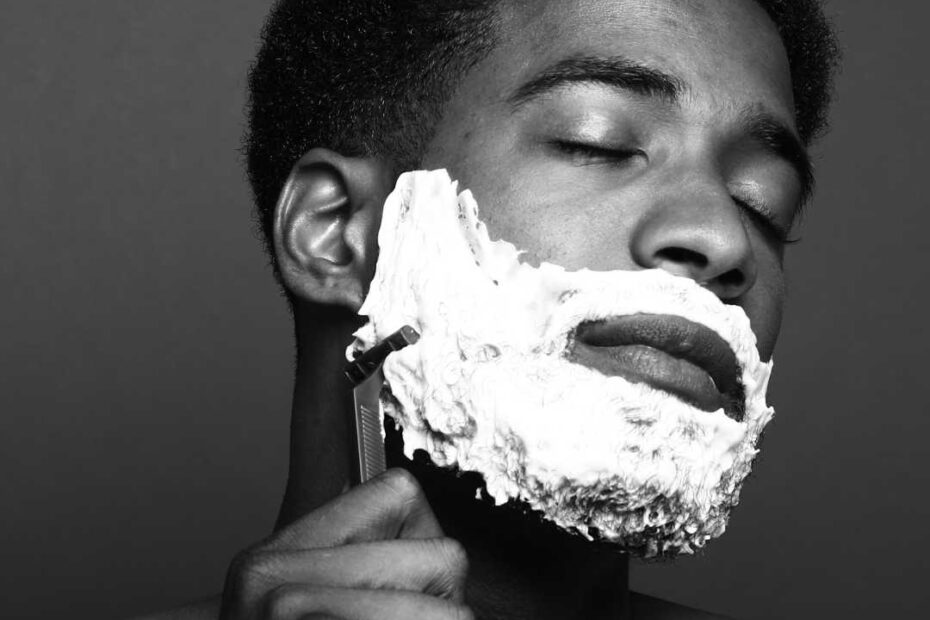 man shaving face