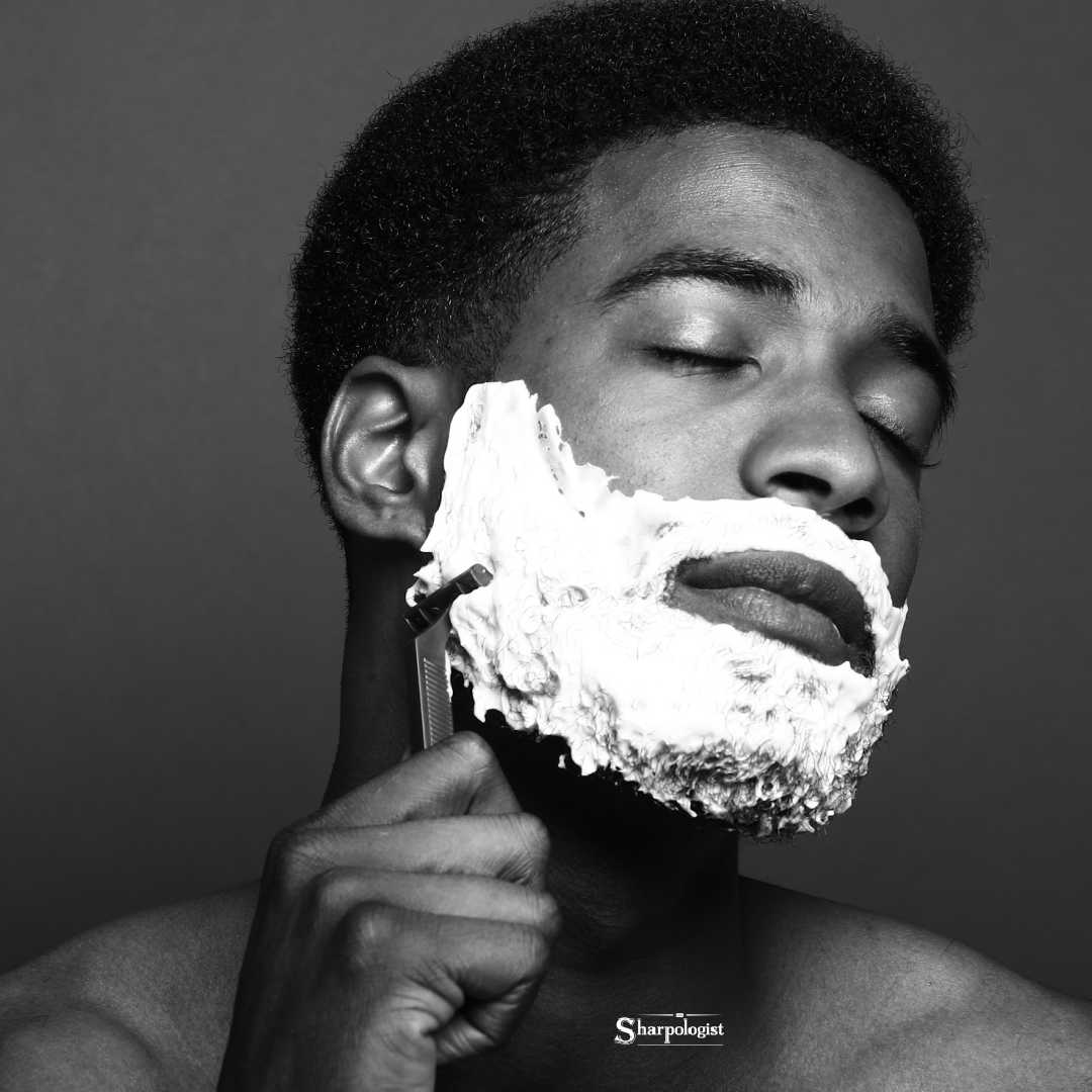 man shaving face